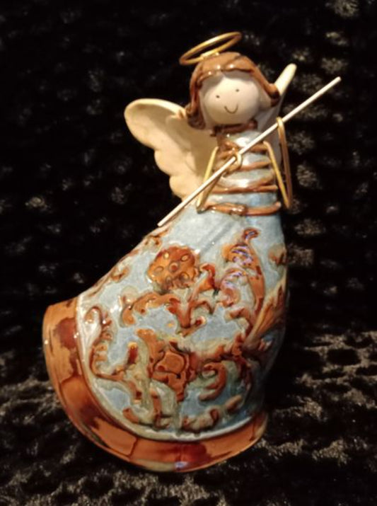 Beautiful Ceramic Angel playing Flute