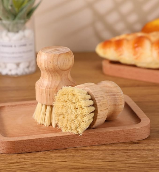 Image of two Bamboo Dish Scrub Brushes Made with eco-friendly bamboo and natural sisal bristles, this brush is perfect for tackling tough messes on dishes, pots, pans, and even sinks and vegetables. 