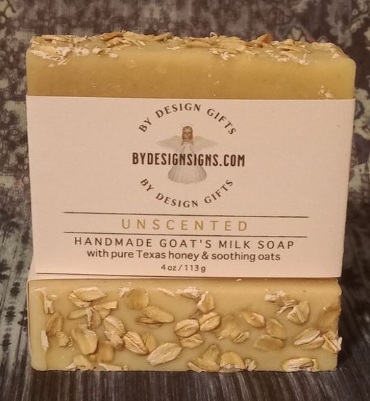 Image of a bar of Soap made of Goats Milk raw honey and organic oats. Our soap will nourish and moisturize your skin while leaving a gentle refreshing scent.